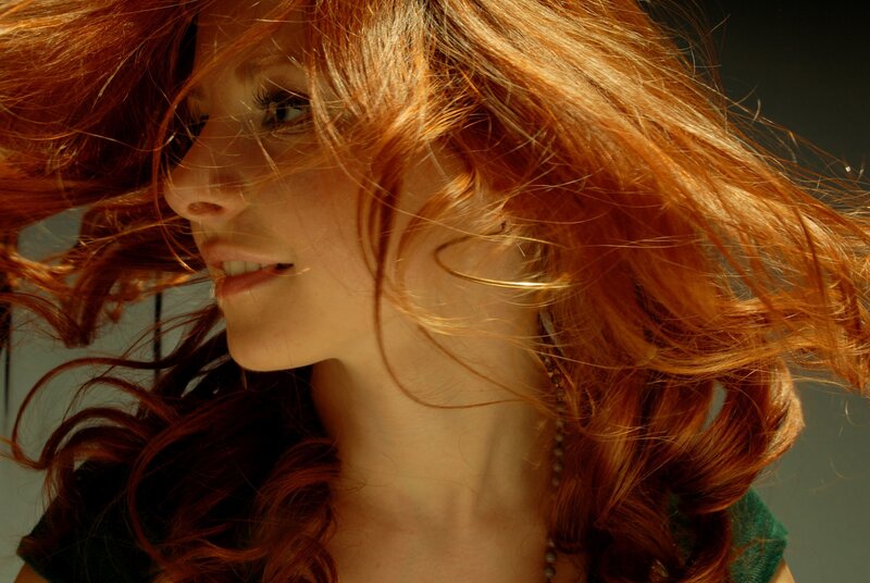 woman with red hair in motion