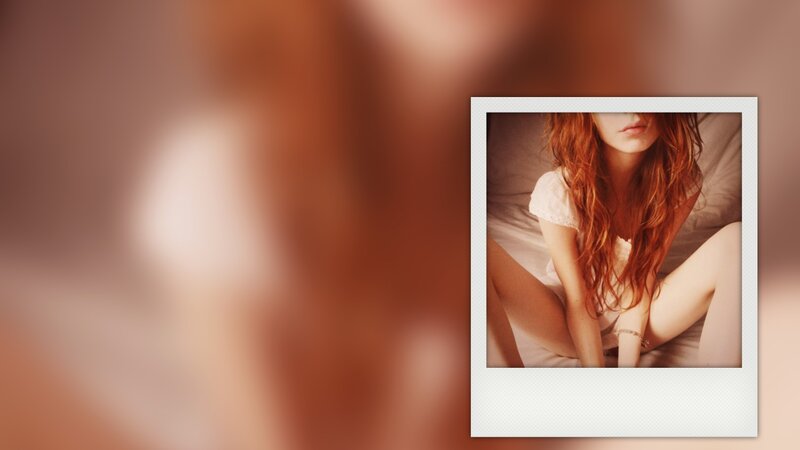woman with red hair in photo