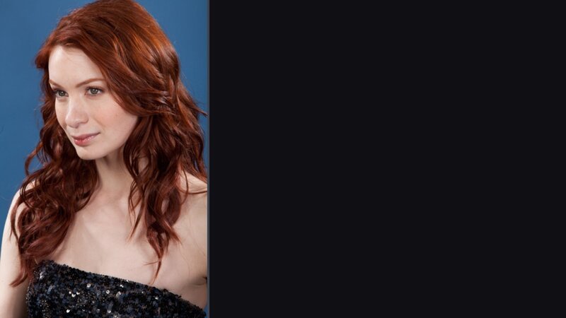 woman with red hair in sequin dress
