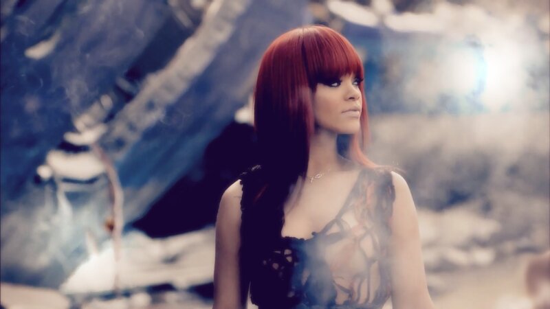 woman with red hair in smoky scene