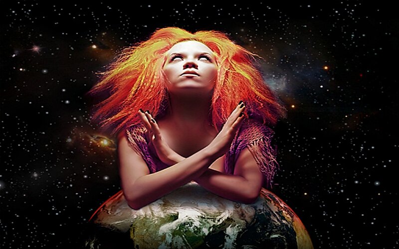 woman with red hair in space