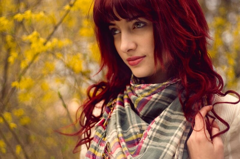 woman with red hair in spring