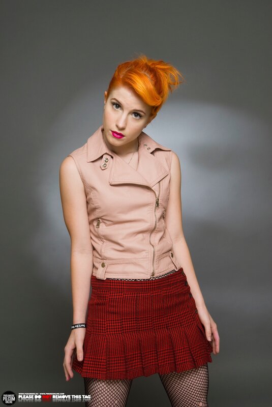 woman with red hair in studio