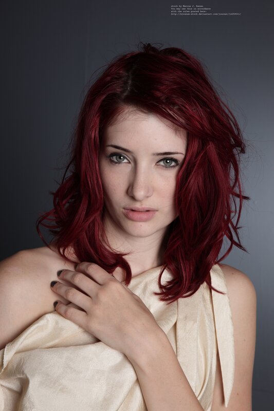 woman with red hair in studio