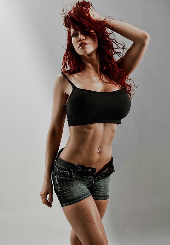 woman with red hair in studio