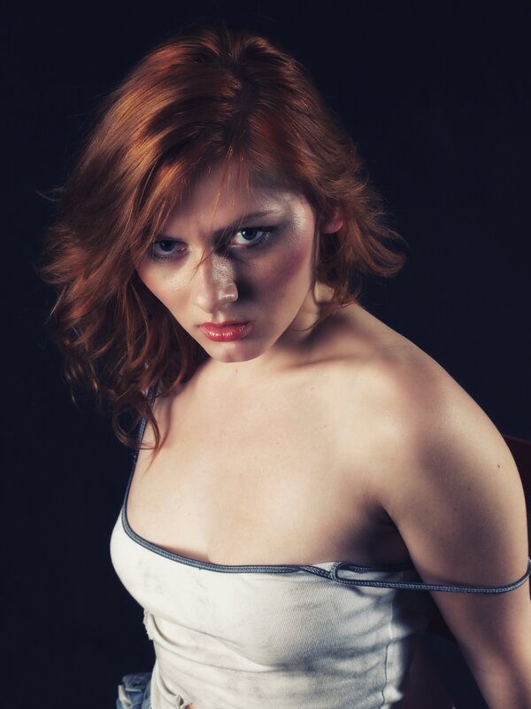 woman with red hair in studio