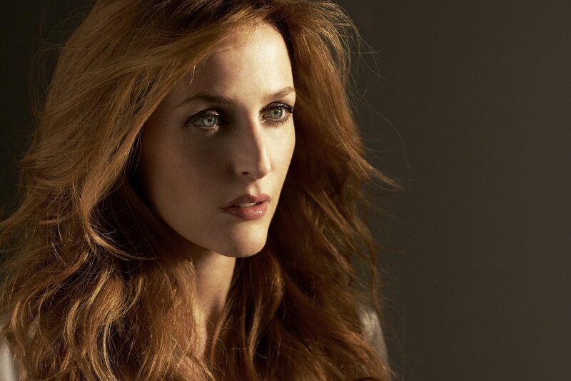 woman with red hair in studio