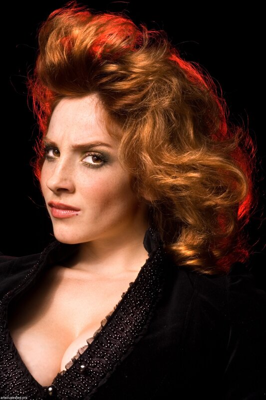 woman with red hair in studio