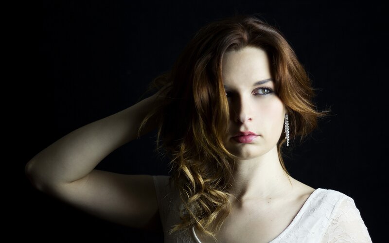 woman with red hair in studio