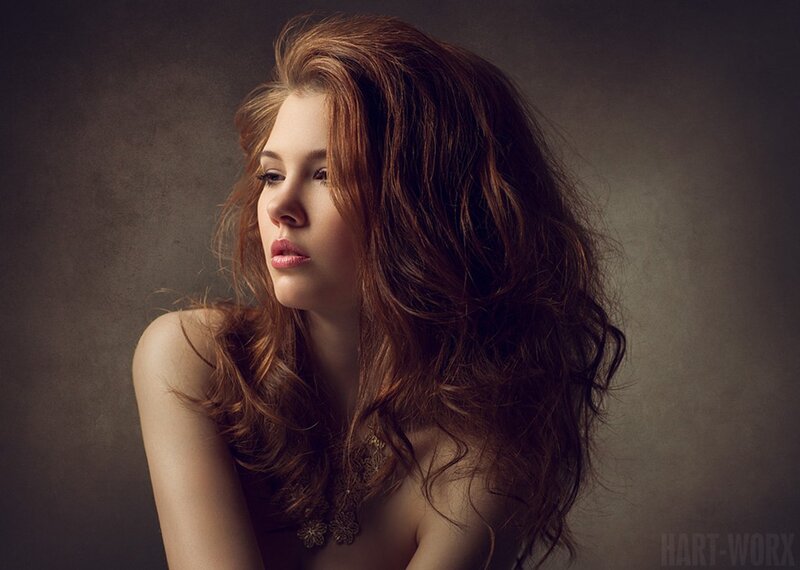 woman with red hair in studio