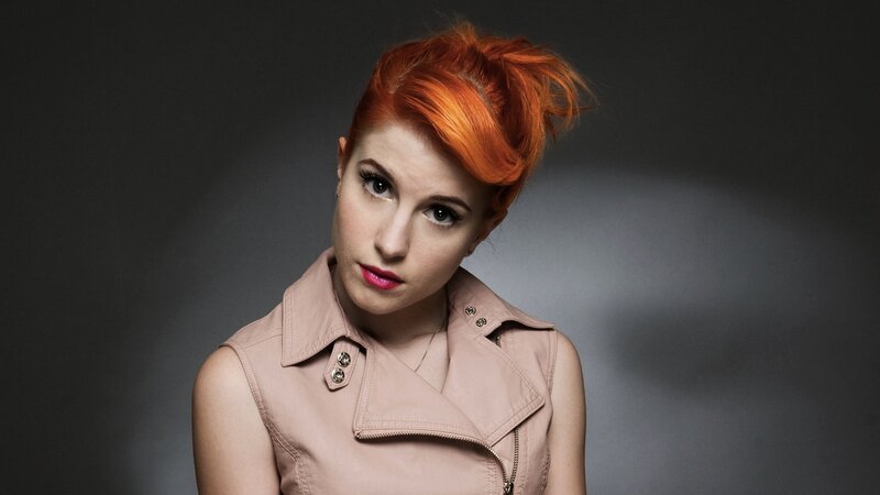 woman with red hair in studio