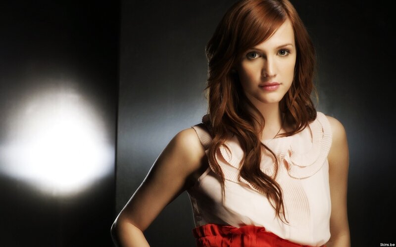 woman with red hair in studio