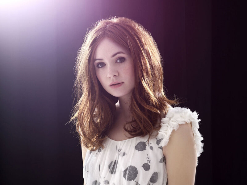 woman with red hair in studio