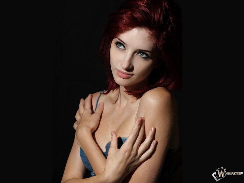 woman with red hair in studio