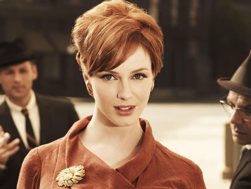 Woman with red hair in vintage setting