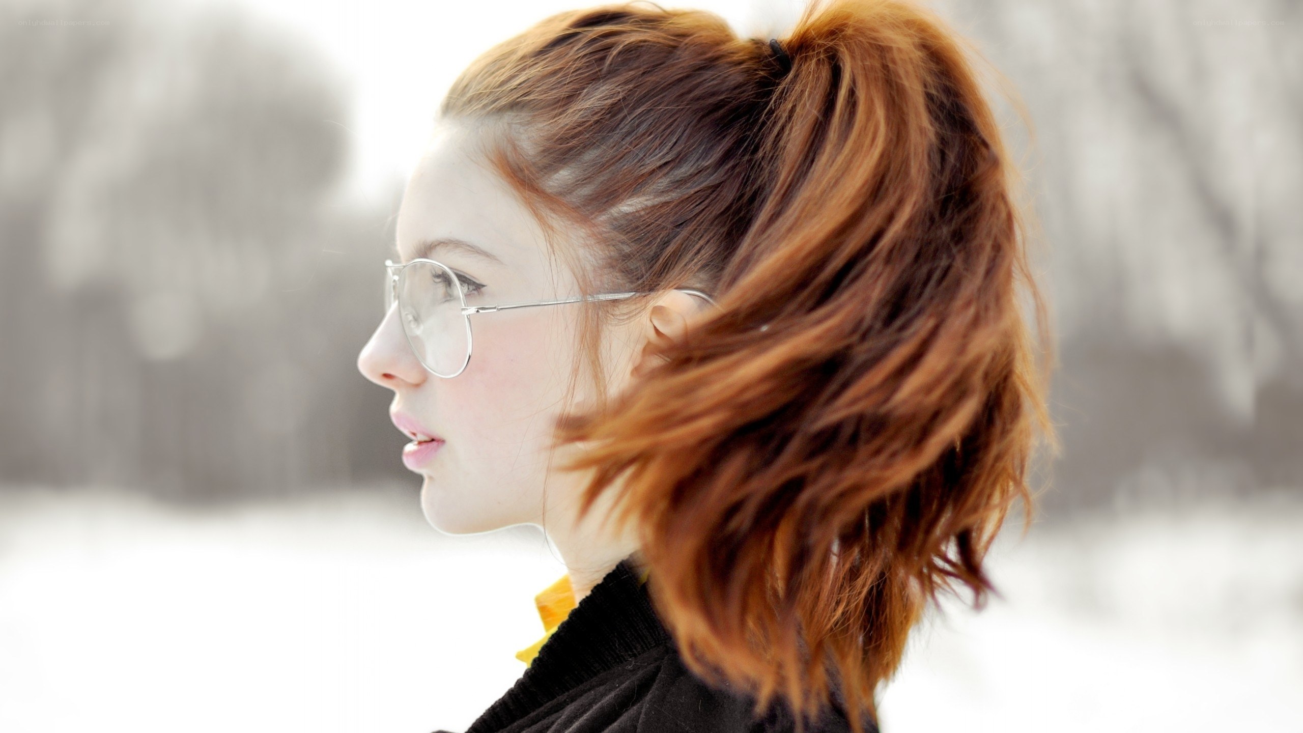 woman with red hair in winter