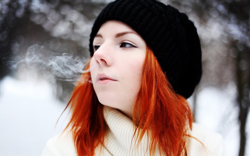 woman with red hair in winter