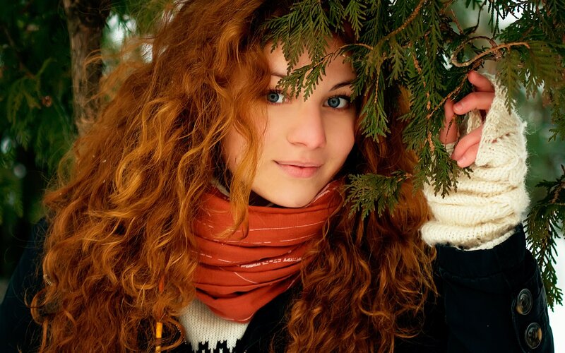 woman with red hair in winter