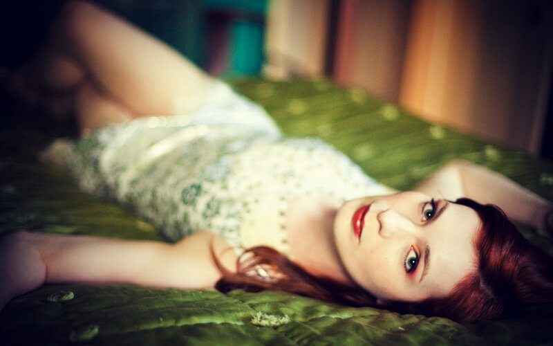 Woman with Red Hair Lying — Green