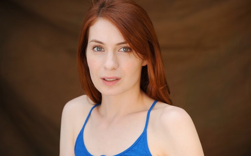 Woman with Red Hair — Neutral, Photograph, Blue Top, Brown Background