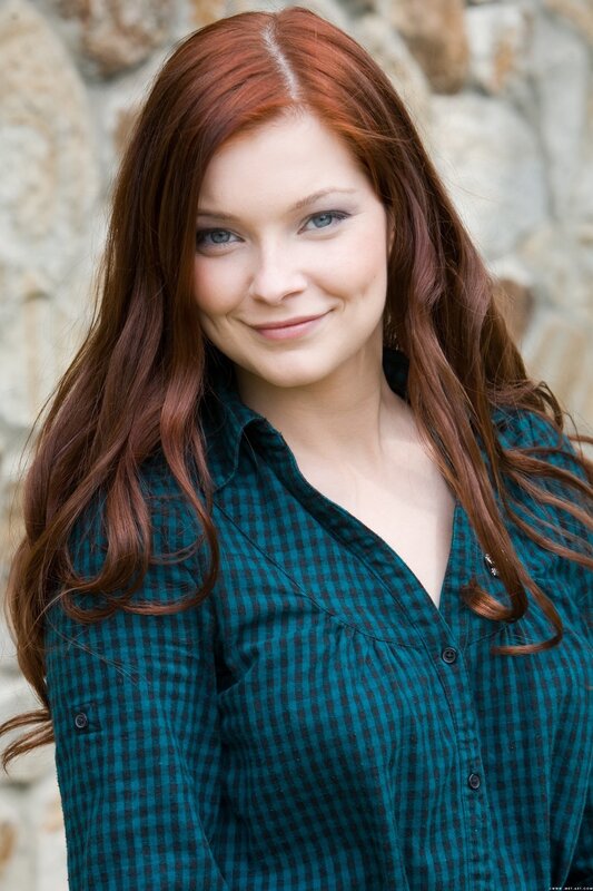 Woman with Red Hair — Neutral, Photograph, Stone Wall, Green