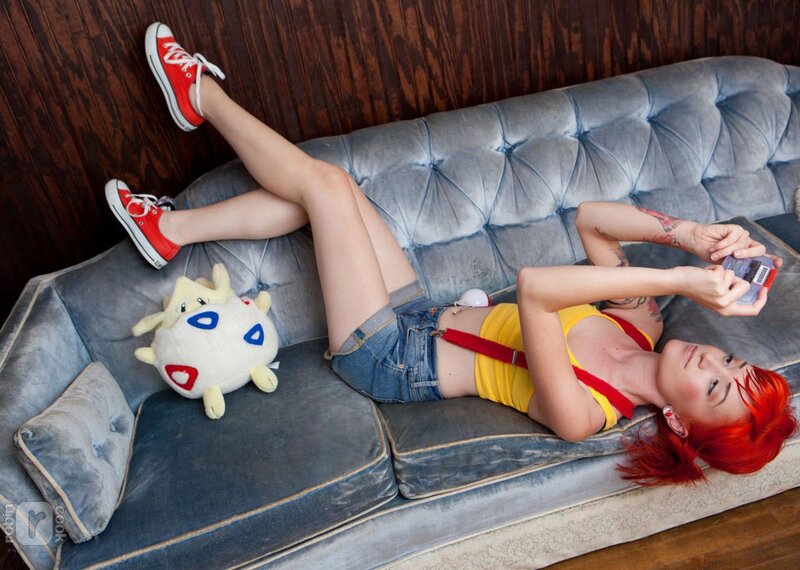 Woman with red hair on couch
