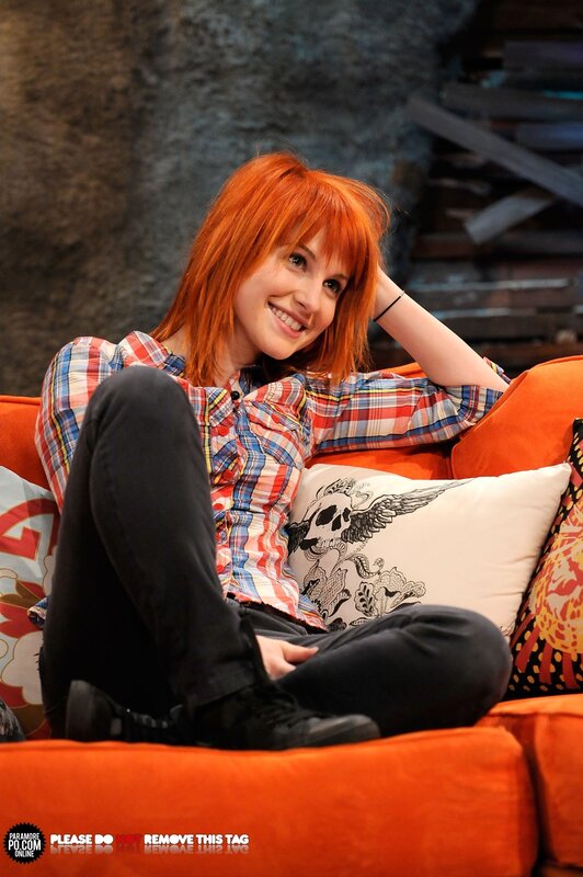 woman with red hair on couch