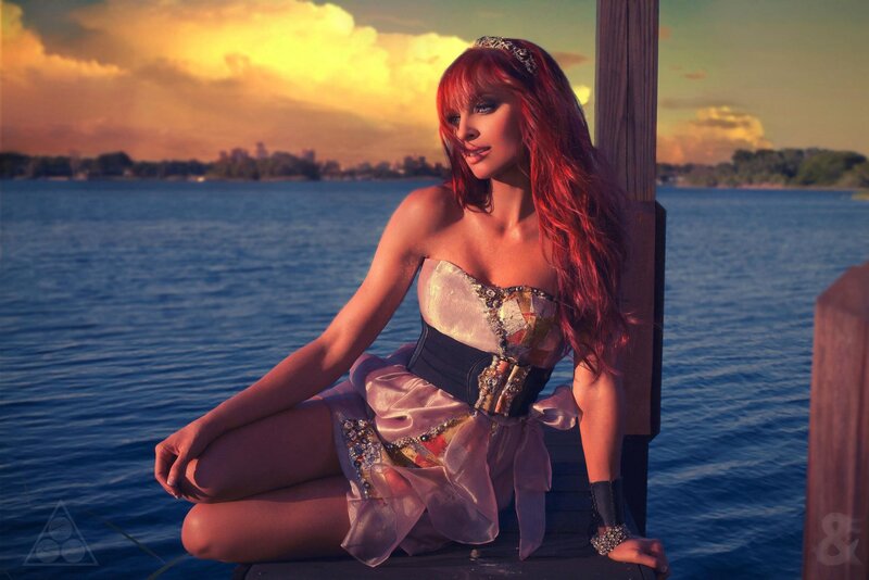 woman with red hair on dock