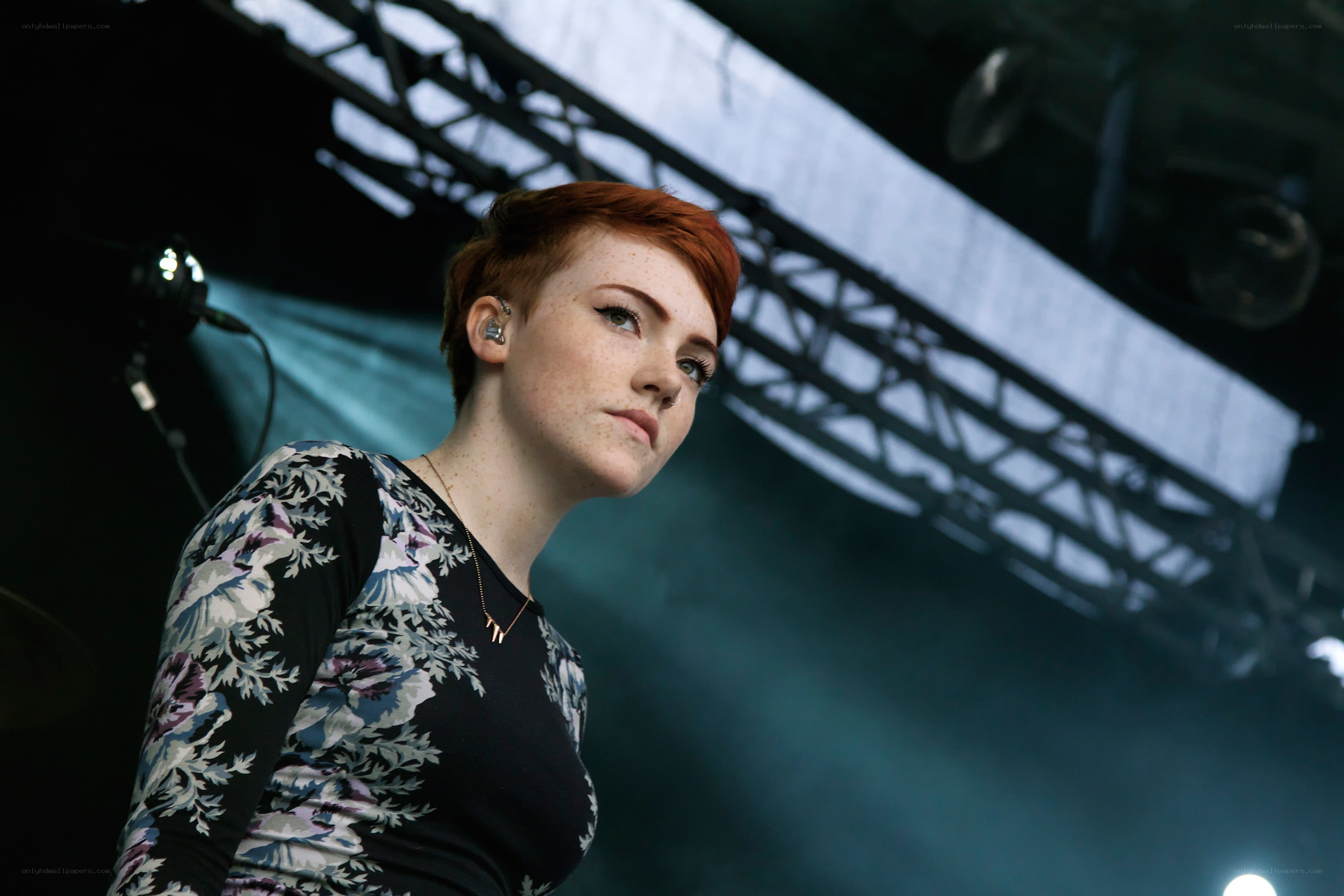 woman with red hair on stage