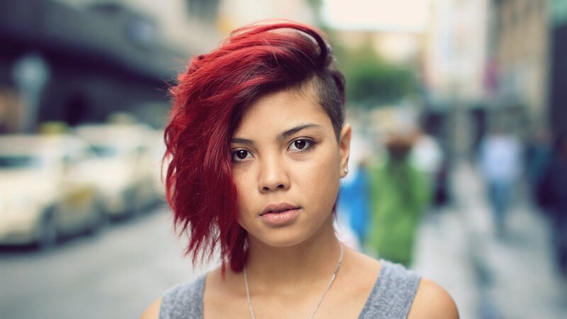 woman with red hair on street
