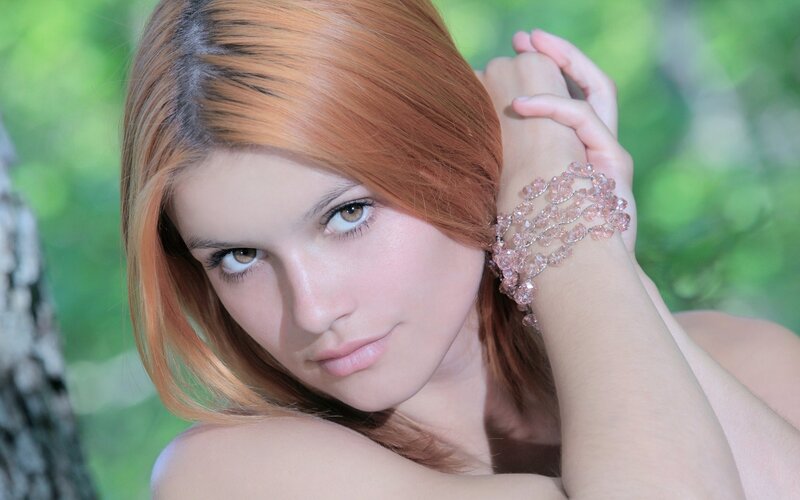 woman with red hair outdoors