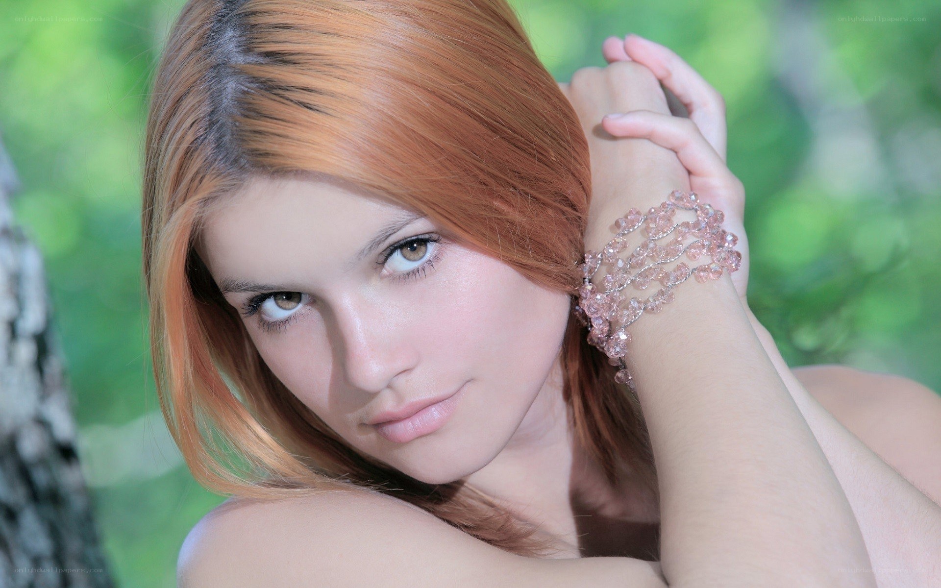woman with red hair outdoors