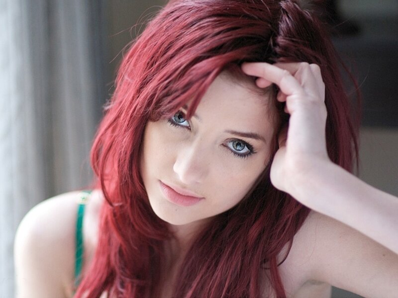 Woman with Red Hair — Pensive