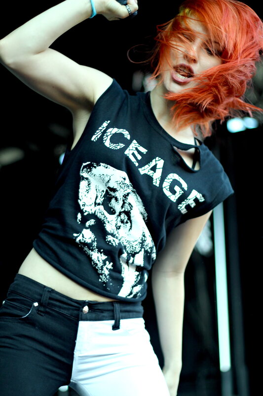 woman with red hair performing