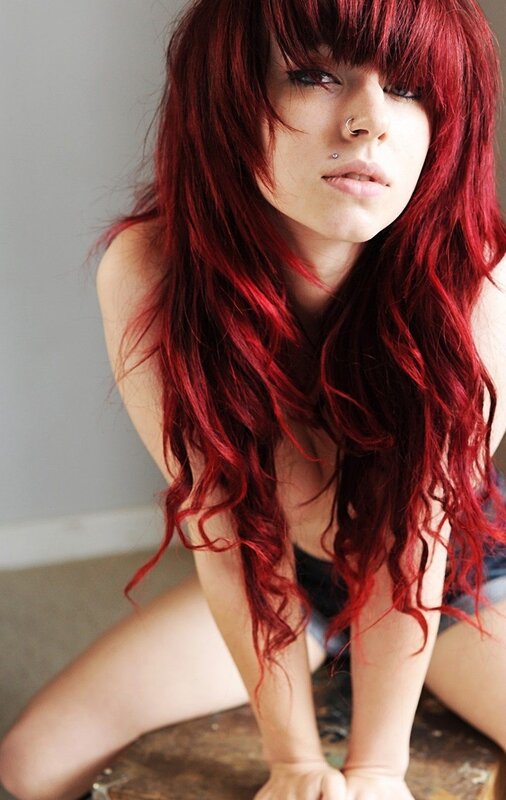 woman with red hair posing