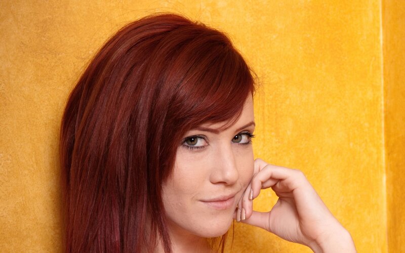 woman with red hair posing