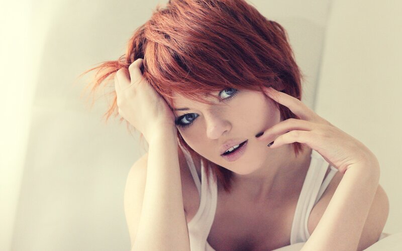 woman with red hair posing
