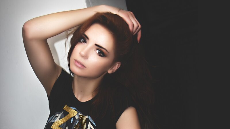 woman with red hair posing