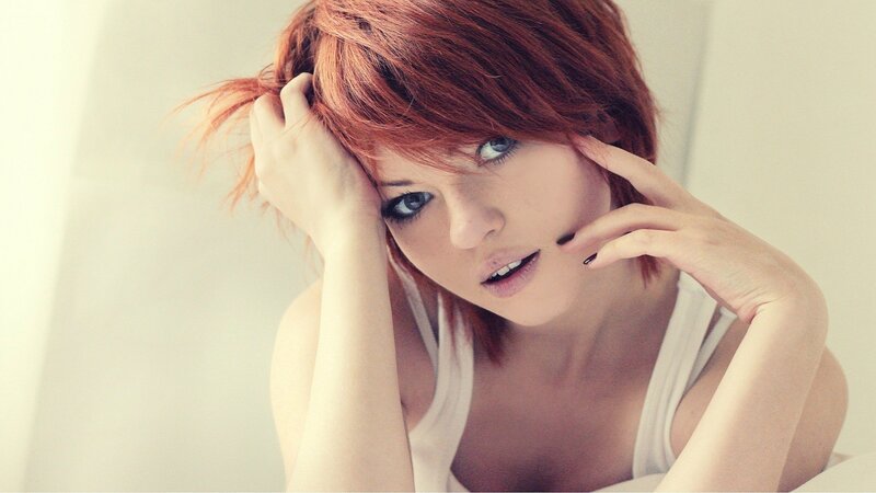 woman with red hair posing