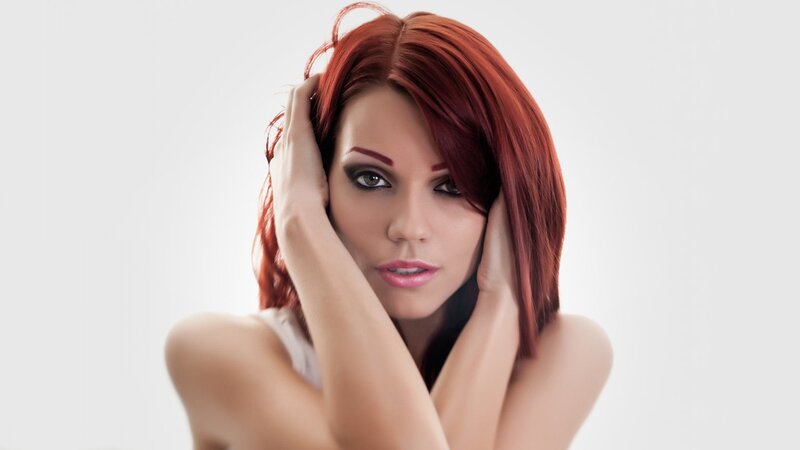 woman with red hair posing