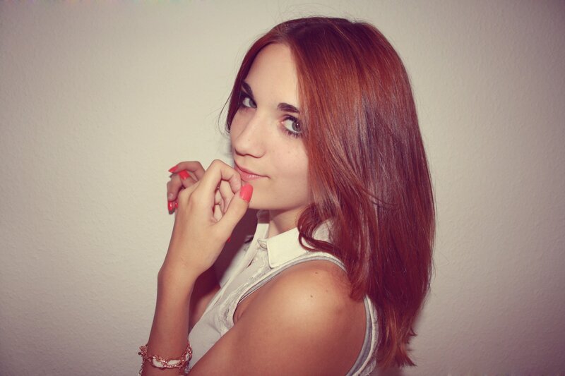 woman with red hair posing