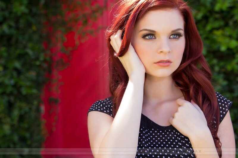 woman with red hair posing