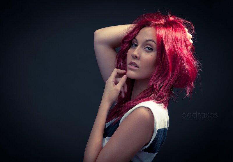 woman with red hair posing