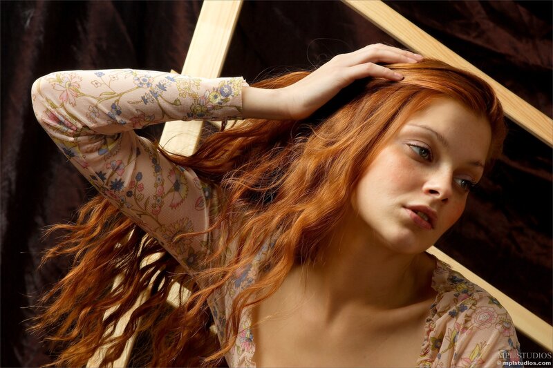woman with red hair posing
