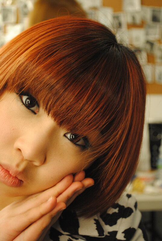 woman with red hair posing