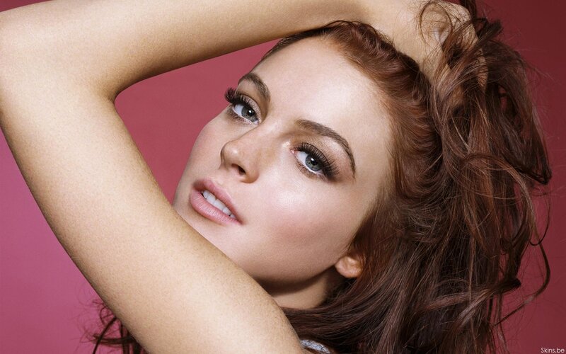 woman with red hair posing