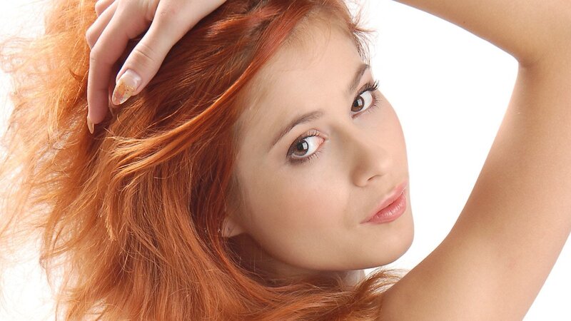 woman with red hair posing