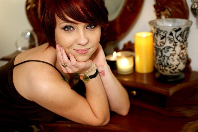 woman with red hair posing
