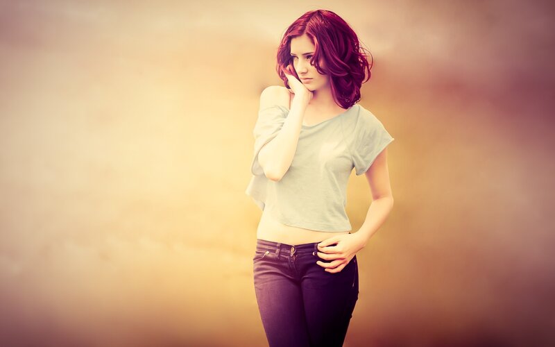 woman with red hair posing