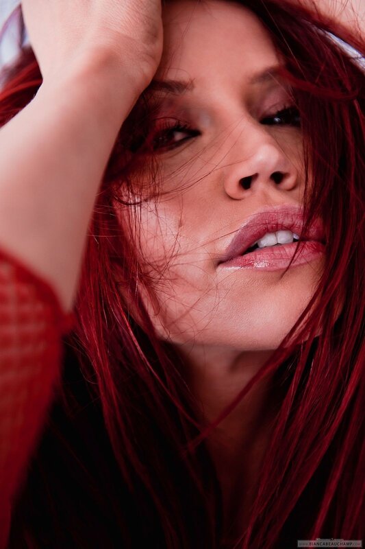 woman with red hair posing